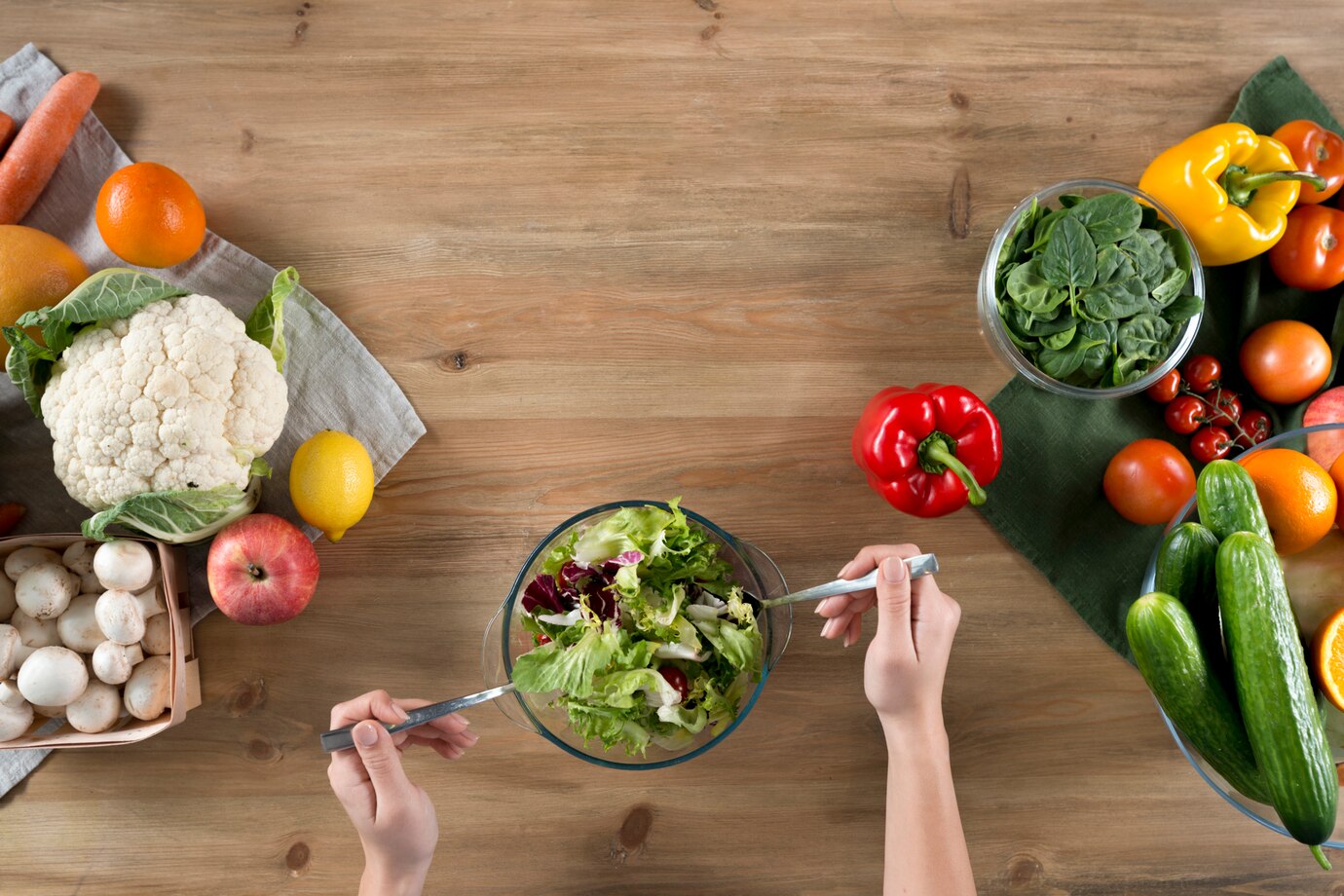 Person S Hand Preparing Fresh Healthy Salad Near Variety Vegetables Fruits Wooden Kitchen Counter 23 2148076180